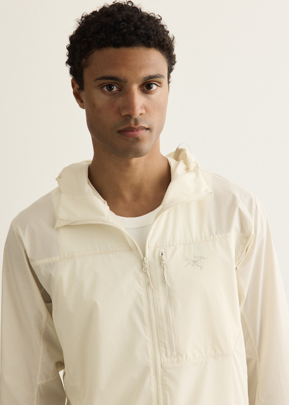 Packable Wind Shell Jacket with Adjustable Hood and Water-Repellent Nylon, Self-Stow Pocket
